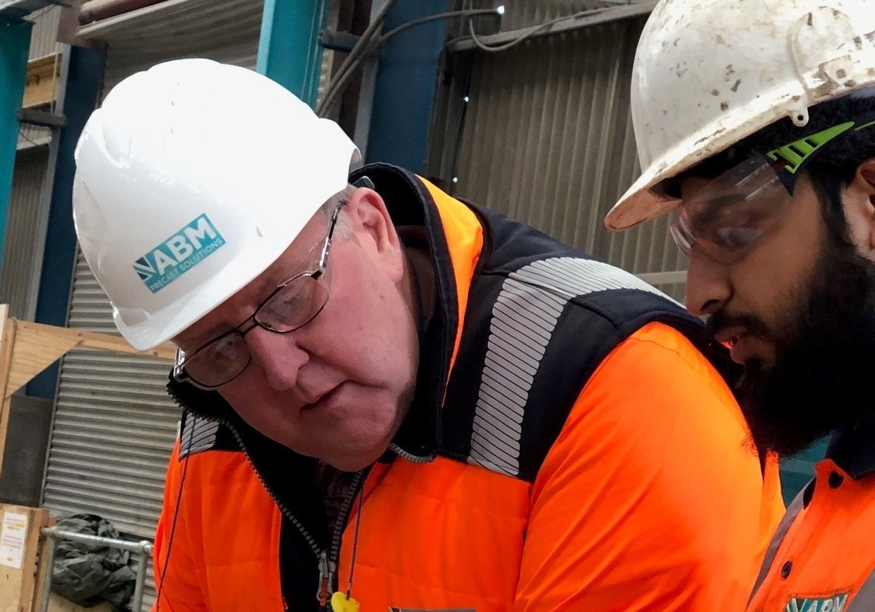 Chris Charlesworth (left) working with Zeehan Khan